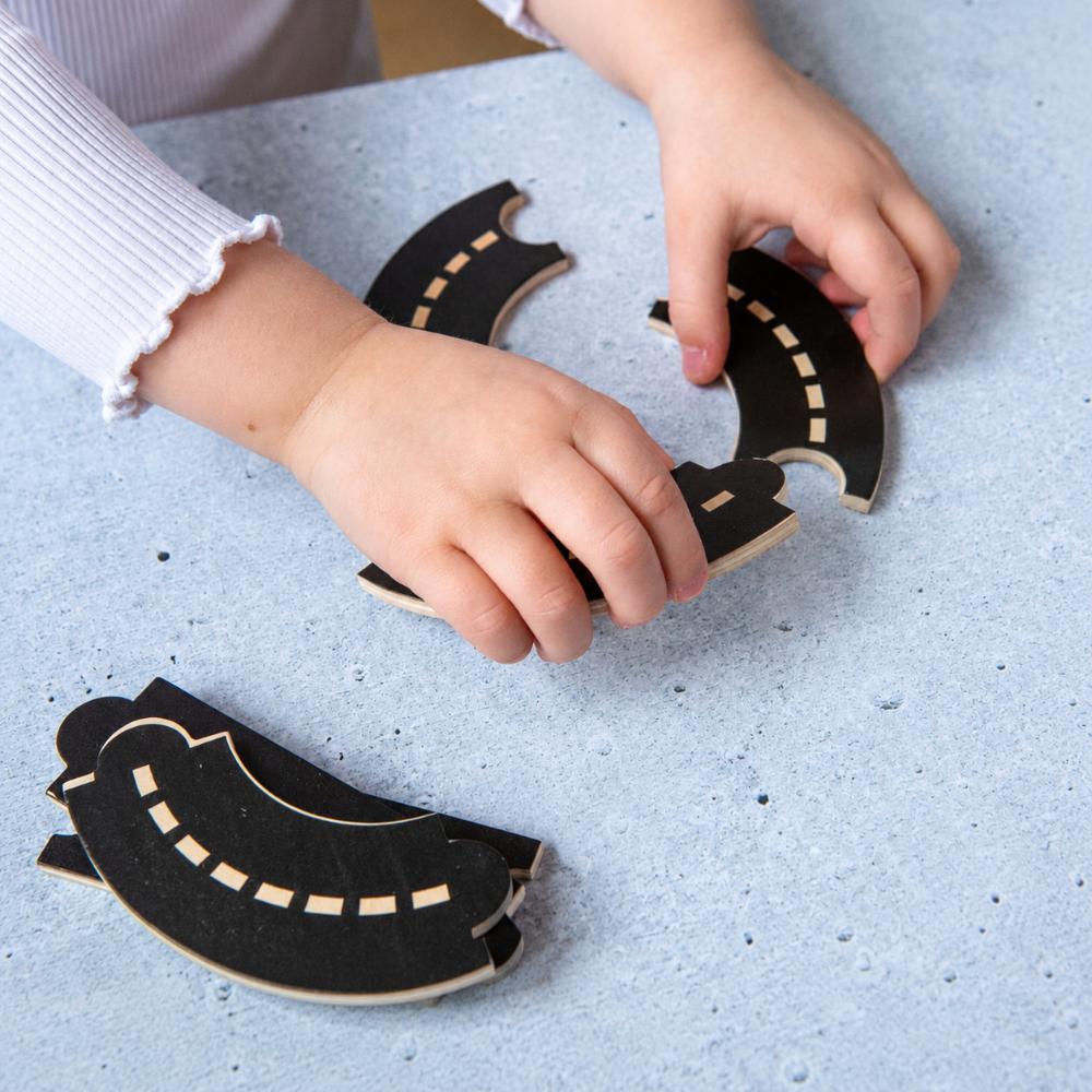 Make Me Iconic Iconic Roads wooden toy road set for kids with reusable straight and curved road pieces for imaginative vehicle play, screen-free play and creating mini Australian streets and towns.
