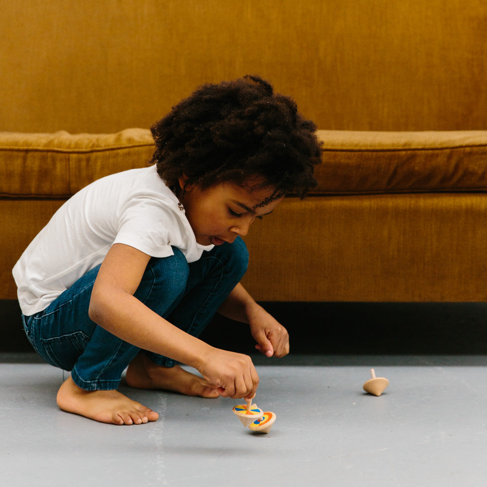 ICONIC TOY -  LOOSE CHANGE SPINNING TOP