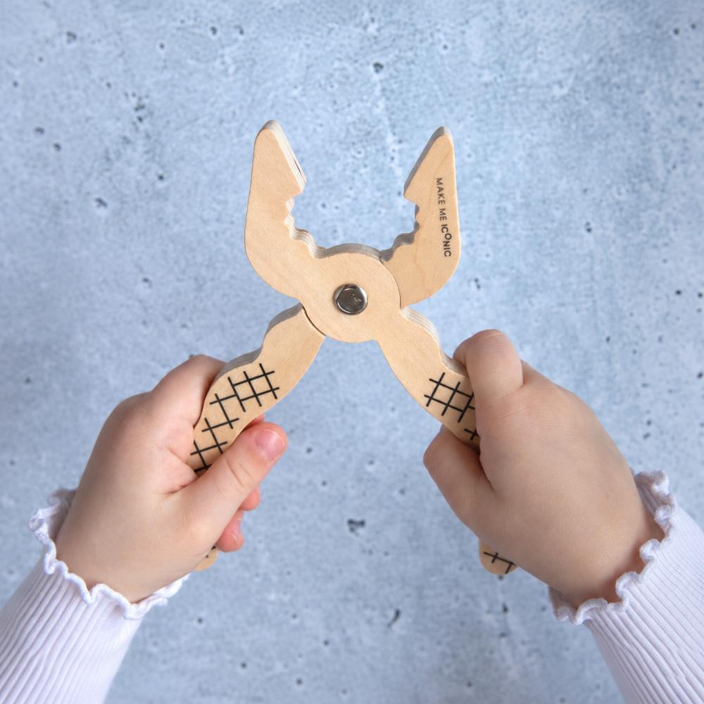 Make Me Iconic Iconic Pliers wood tool toy for kids, a durable wooden pretend play tool designed for little hands, imaginative builder play, construction role play and screen-free play.