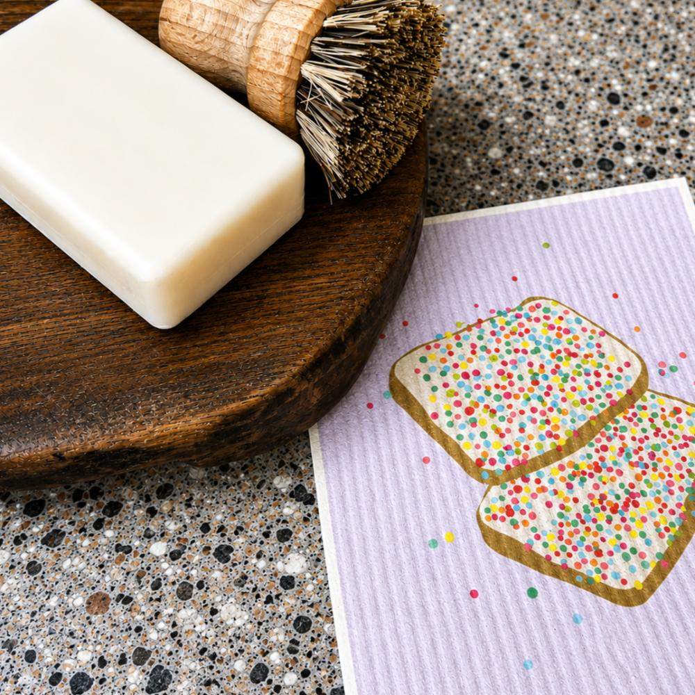 kitchen sponge shaped like iconic aussie fairy bread with colourful sprinkles on white background – playful australian kitchen decor sponge, nostalgic aussie gift, cute cleaning accessory, quirky homewares, fun kitchen sponge, australian food inspired design, modern retro style, colourful household sponge, unique australian souvenir