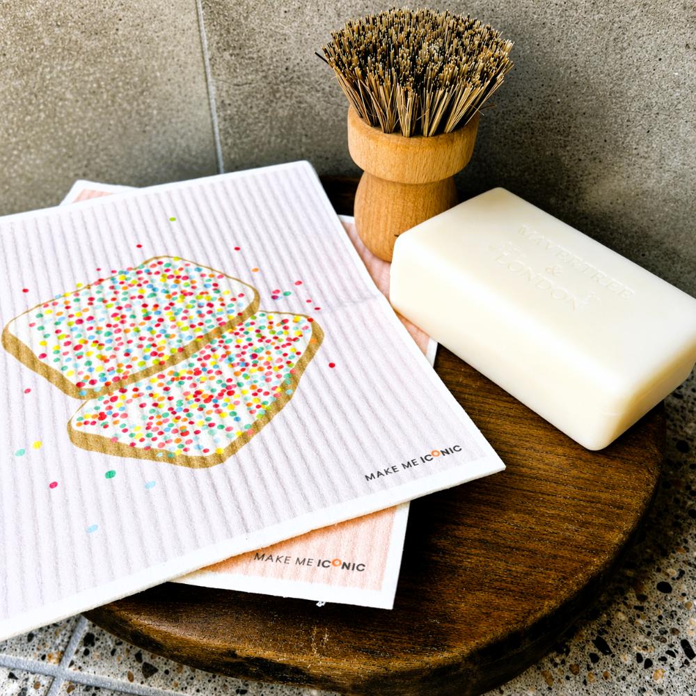 kitchen sponge shaped like iconic aussie fairy bread with colourful sprinkles on white background – playful australian kitchen decor sponge, nostalgic aussie gift, cute cleaning accessory, quirky homewares, fun kitchen sponge, australian food inspired design, modern retro style, colourful household sponge, unique australian souvenir