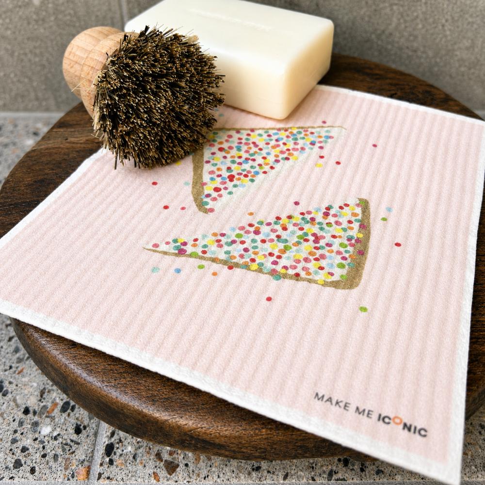 kitchen sponge shaped like iconic aussie fairy bread with colourful sprinkles on white background – playful australian kitchen decor sponge, nostalgic aussie gift, cute cleaning accessory, quirky homewares, fun kitchen sponge, australian food inspired design, modern retro style, colourful household sponge, unique australian souvenir
