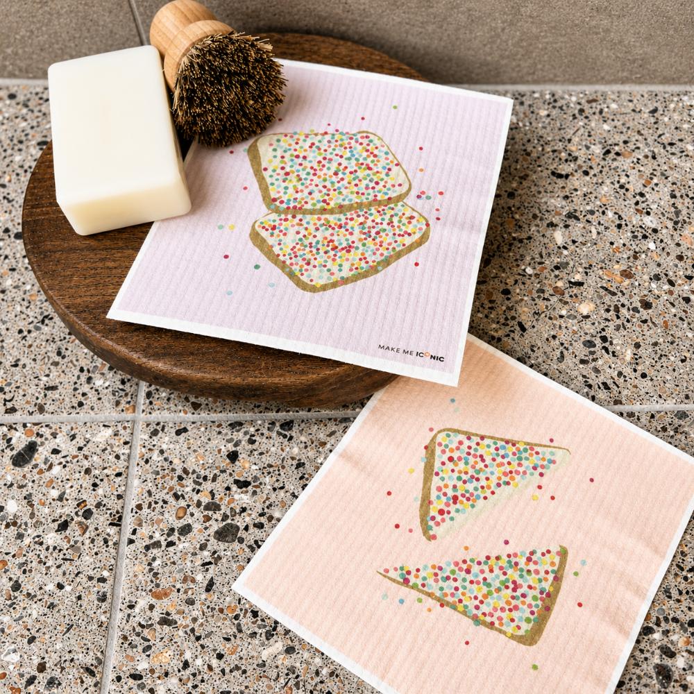 kitchen sponge shaped like iconic aussie fairy bread with colourful sprinkles on white background – playful australian kitchen decor sponge, nostalgic aussie gift, cute cleaning accessory, quirky homewares, fun kitchen sponge, australian food inspired design, modern retro style, colourful household sponge, unique australian souvenir