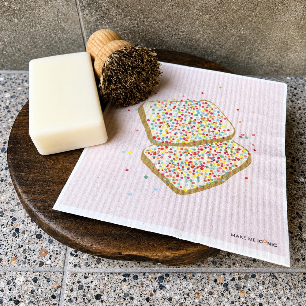 kitchen sponge shaped like iconic aussie fairy bread with colourful sprinkles on white background – playful australian kitchen decor sponge, nostalgic aussie gift, cute cleaning accessory, quirky homewares, fun kitchen sponge, australian food inspired design, modern retro style, colourful household sponge, unique australian souvenir