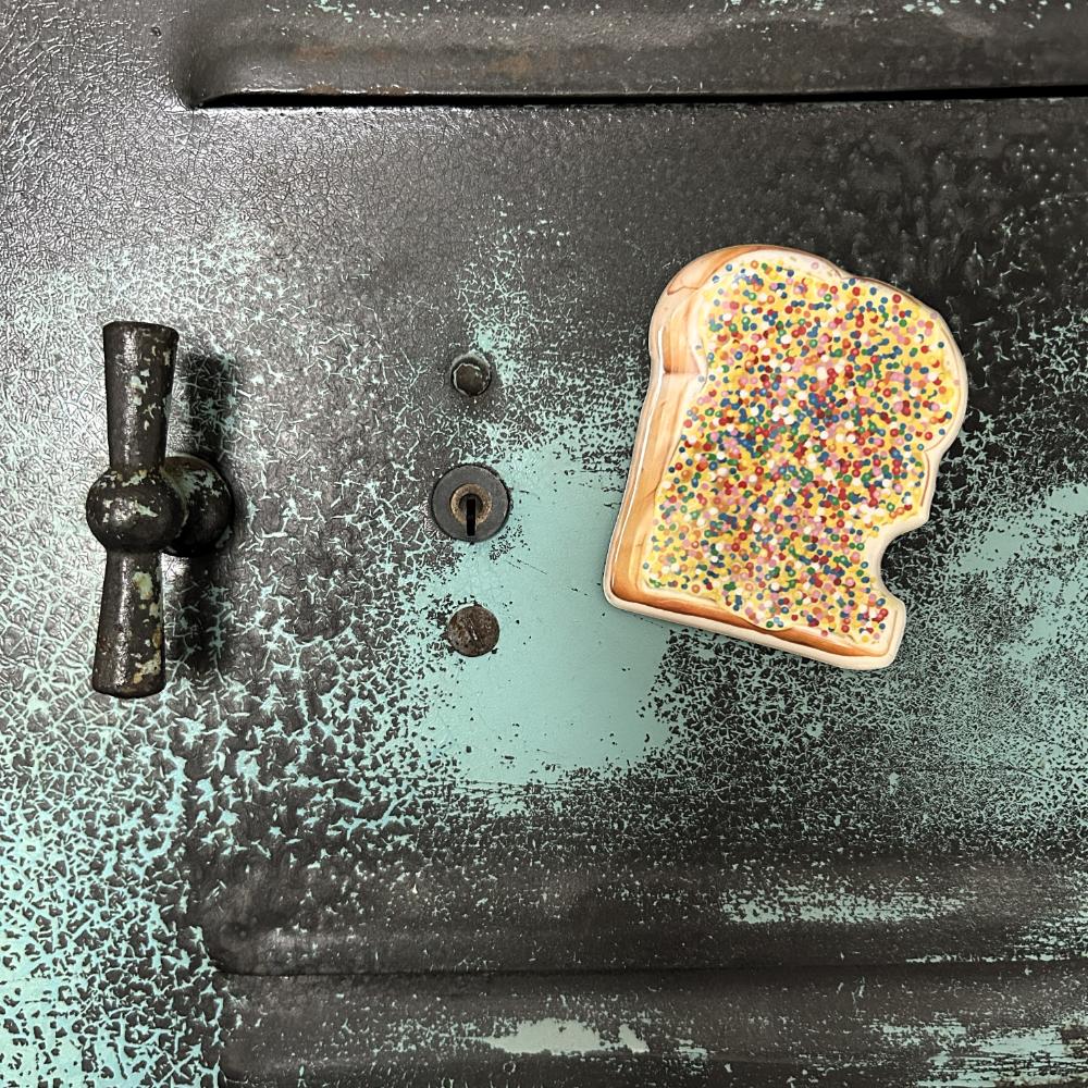 Iconic Fairy Bread Magnet featuring colourful rainbow sprinkles on buttered white bread, inspired by the nostalgic Aussie party favourite. A playful Australian fridge magnet perfect for holding notes, shopping lists and kids’ artwork.