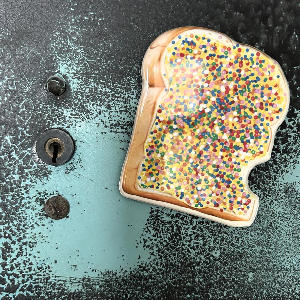 Iconic Fairy Bread Magnet featuring colourful rainbow sprinkles on buttered white bread, inspired by the nostalgic Aussie party favourite. A playful Australian fridge magnet perfect for holding notes, shopping lists and kids’ artwork.