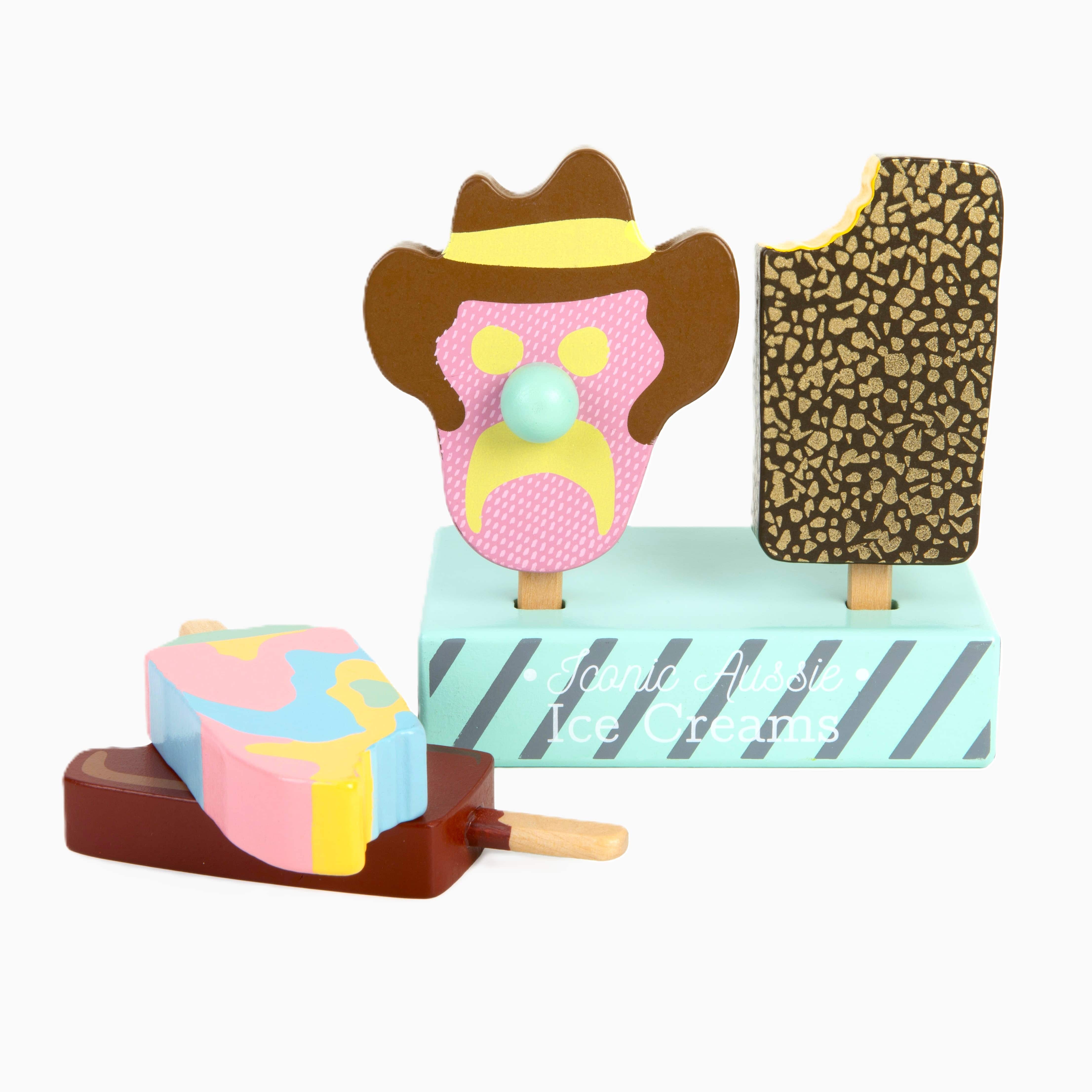 Wooden toy ice cream set with Bubble O’ Bill, Golden Gaytime, Mint Choc Wedge, Rainbow Paddle Pop, wooden stand and paper bags for pretend play.
