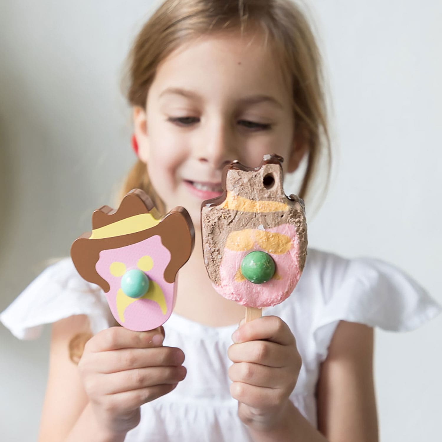 Wooden toy ice cream set with Bubble O’ Bill, Golden Gaytime, Mint Choc Wedge, Rainbow Paddle Pop, wooden stand and paper bags for pretend play.