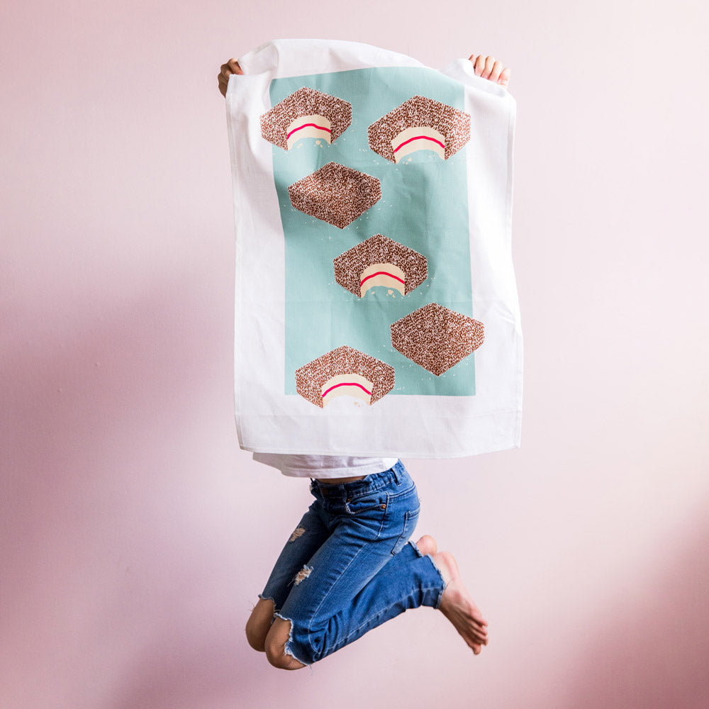 Australian Lamington Tea Towel featuring a bold retro design, 100% cotton kitchen towel celebrating classic Aussie desserts and nostalgic treats.