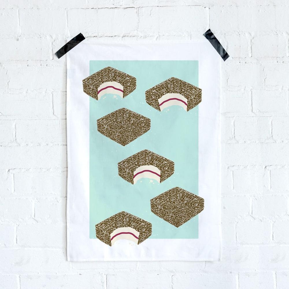 Australian Lamington Tea Towel featuring a bold retro design, 100% cotton kitchen towel celebrating classic Aussie desserts and nostalgic treats.