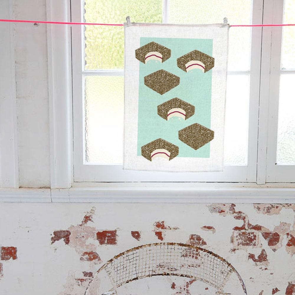 Australian Lamington Tea Towel featuring a bold retro design, 100% cotton kitchen towel celebrating classic Aussie desserts and nostalgic treats.