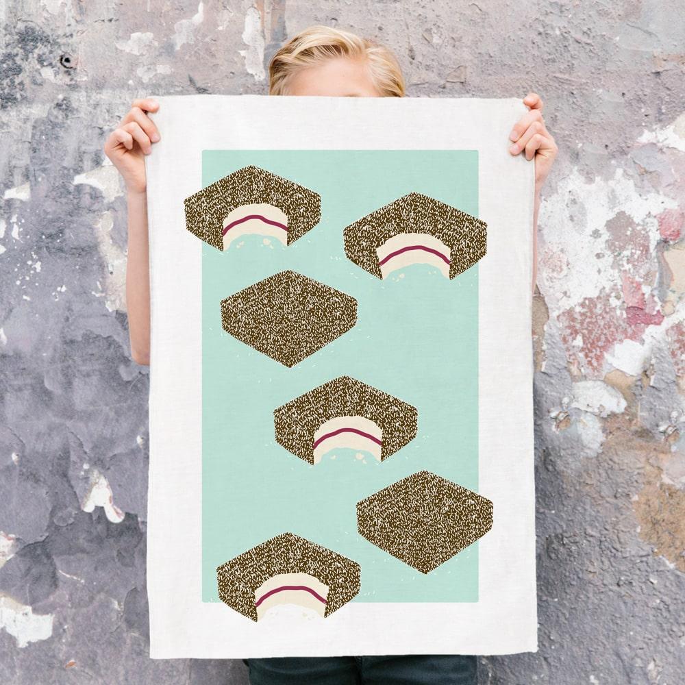 Australian Lamington Tea Towel featuring a bold retro design, 100% cotton kitchen towel celebrating classic Aussie desserts and nostalgic treats.