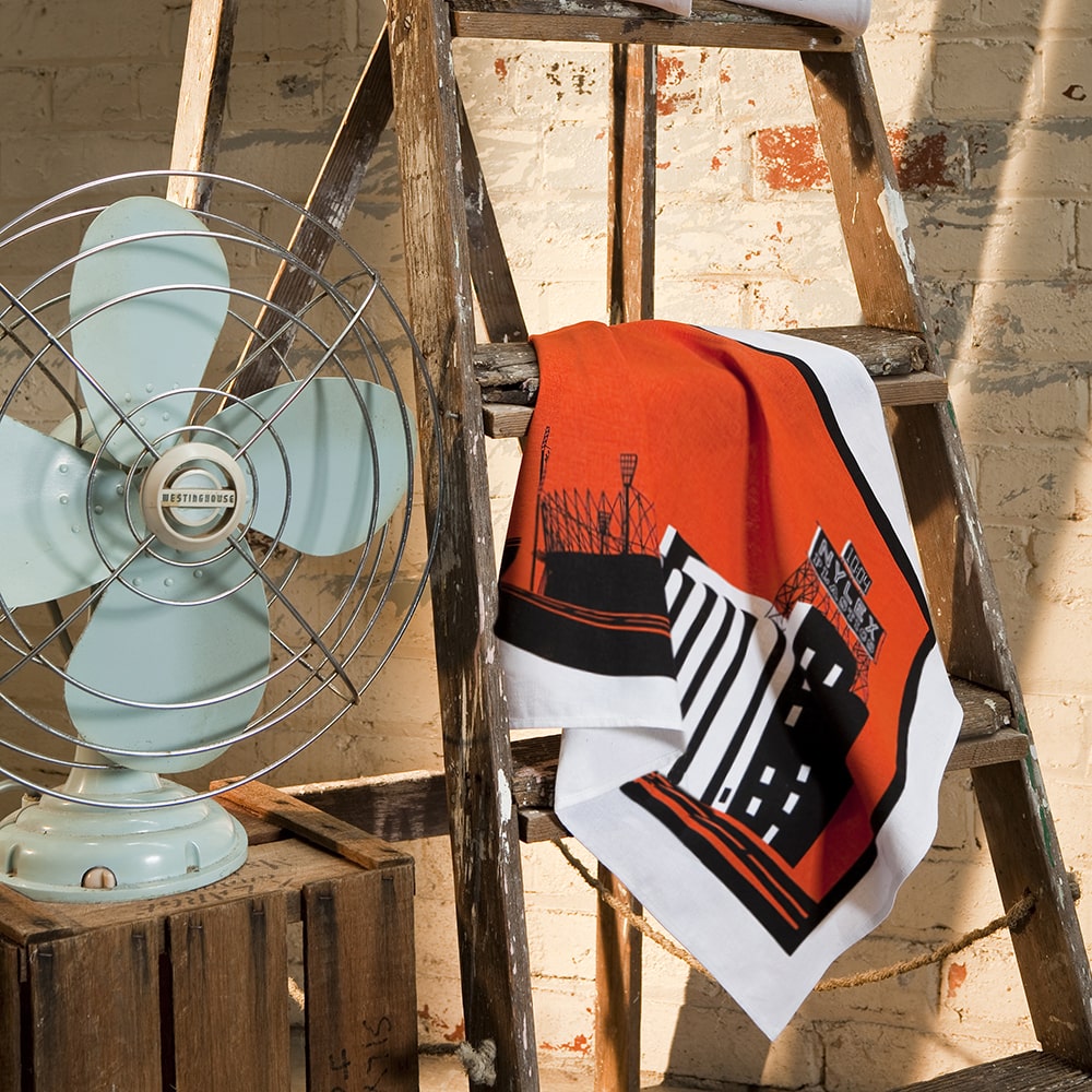 Iconic Melbourne Nylex Tea Towel featuring the famous rooftop sign design, celebrating vintage industrial charm and classic Australian design.