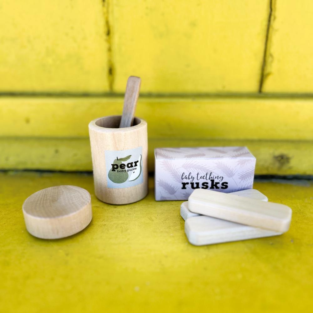 Make Me Iconic 3-piece wooden toy jar set with jar, removable lid, and wooden spoon is perfect for pretend play, scooping fun, and imaginative role play.