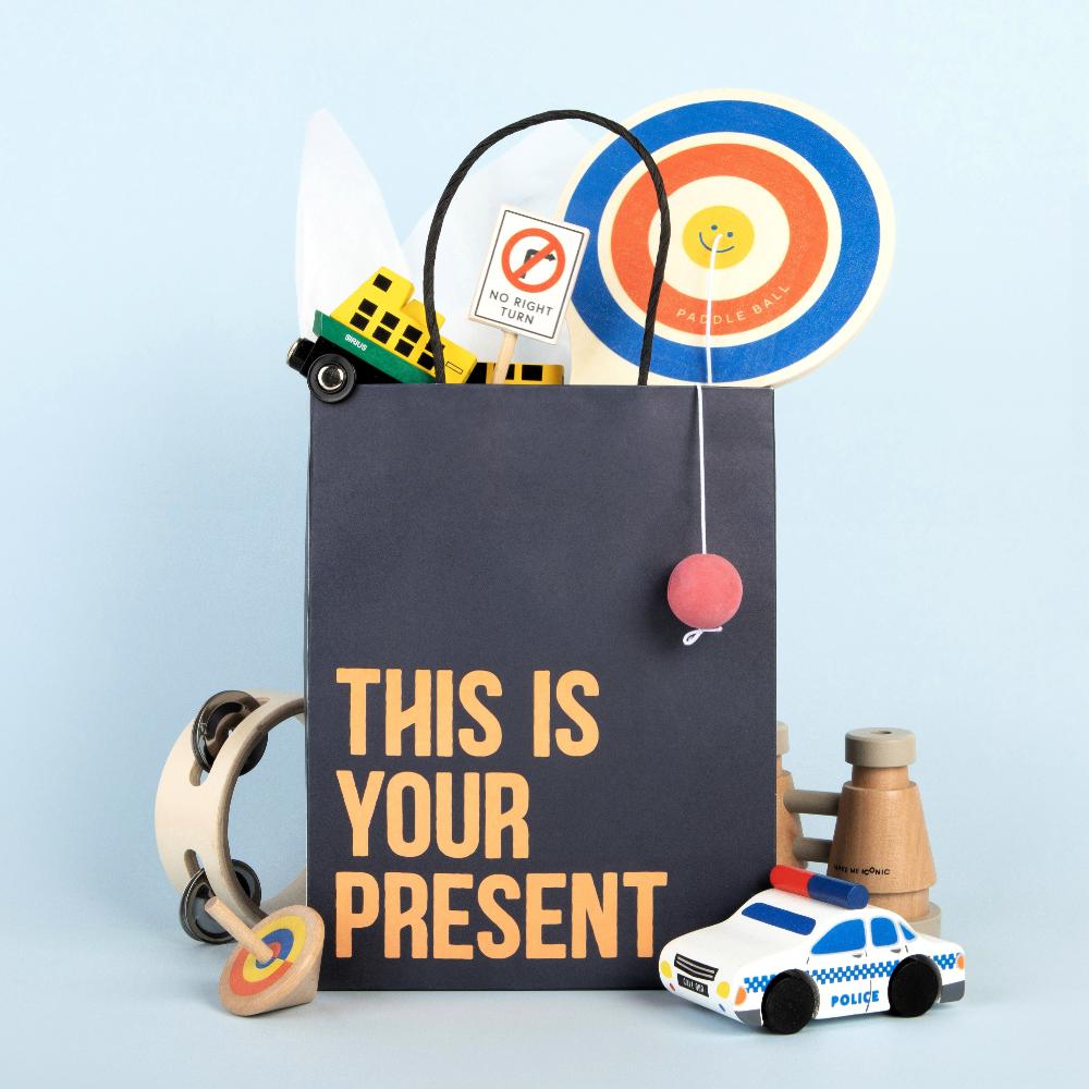 Make Me Iconic wooden Australian road sign toy set featuring 5 double-sided traffic signs with kangaroo, koala, and speed camera icons for imaginative car and city play.