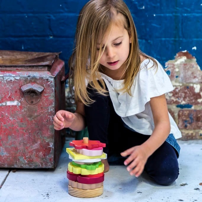 Wooden Aussie stacking burger toy for kids with colourful layers, mini flags, and chunky pieces—perfect for imaginative food play and motor skill development.