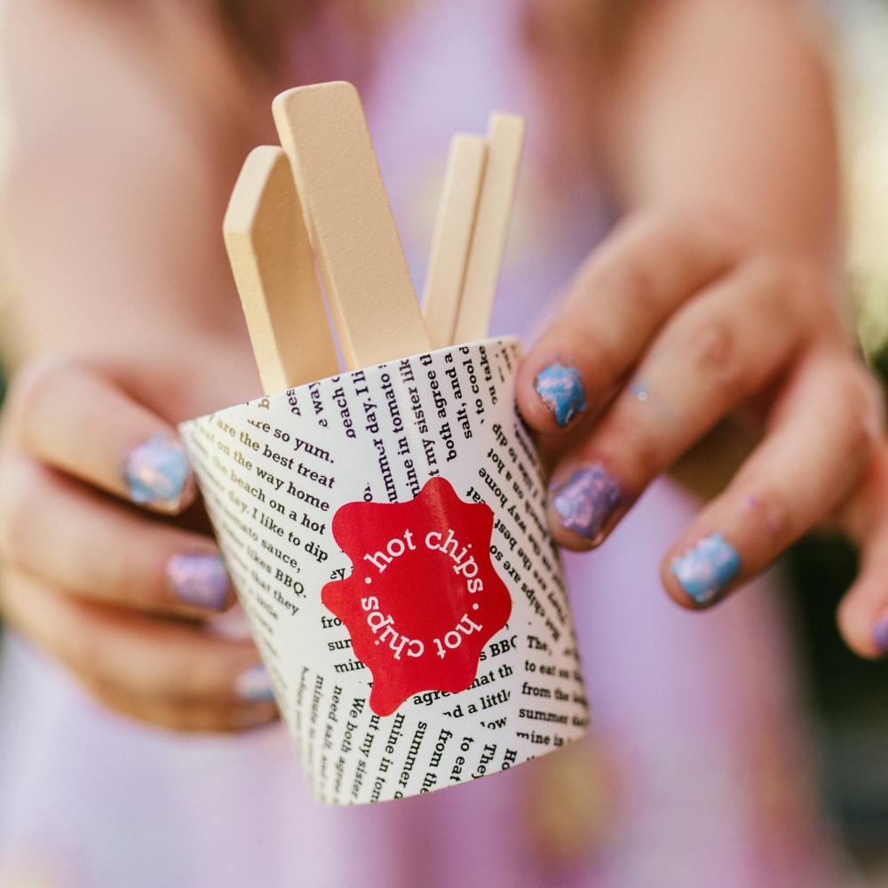 Make Me Iconic Australian wooden toy food set, 38-piece pretend play set featuring Vegemite, Fairy Bread, Pavlova, Lamington, meat pie, snag in bread, and hot Chips with sauce for imaginative kitchen play.