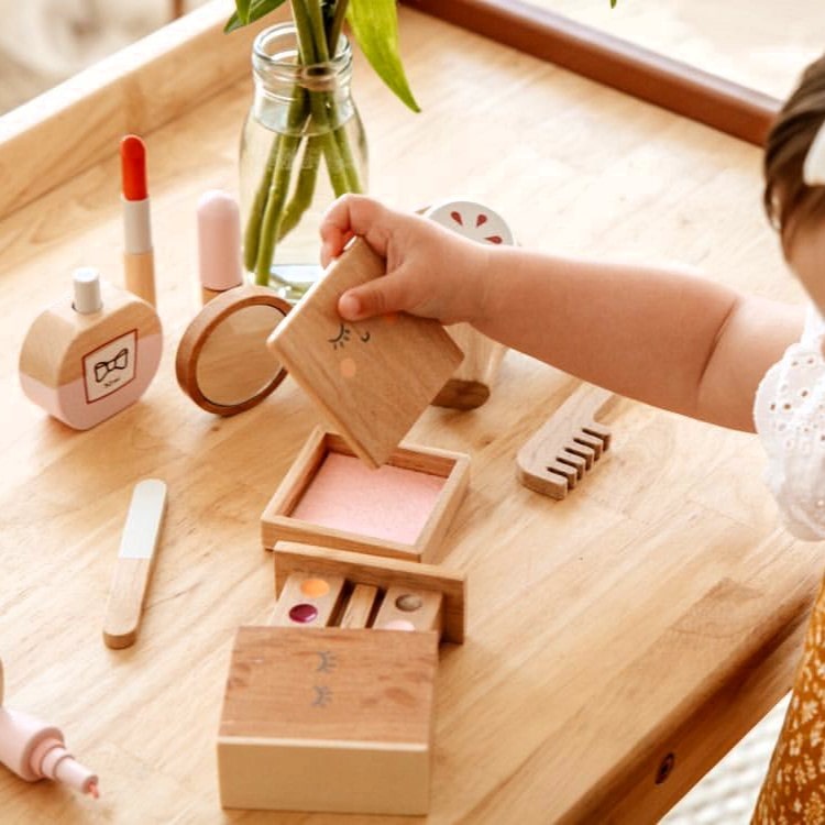 Wooden toy beauty kit for kids with mirror, lipstick, compact and perfume designed for pretend play, dress-ups and creative role-play activities