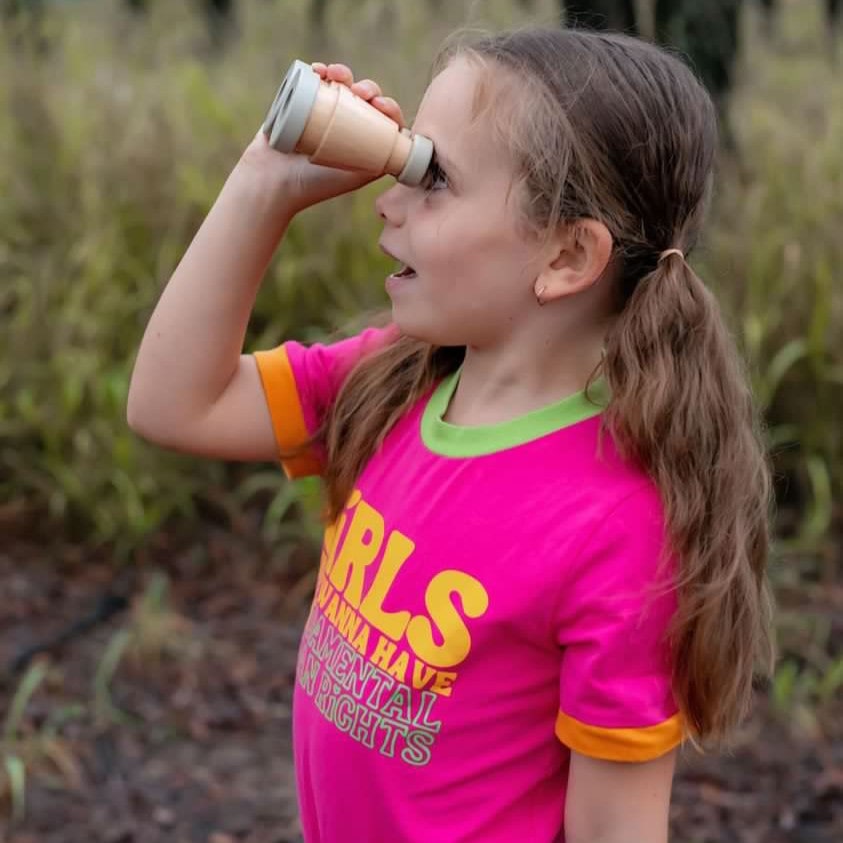 Make Me Iconic wooden toy binoculars with a smooth natural finish, perfectly sized for little hands. Ideal for pretend play adventures like pirate hunts, backyard exploration, or spy missions, encouraging creativity and role-play without screens or batteries.