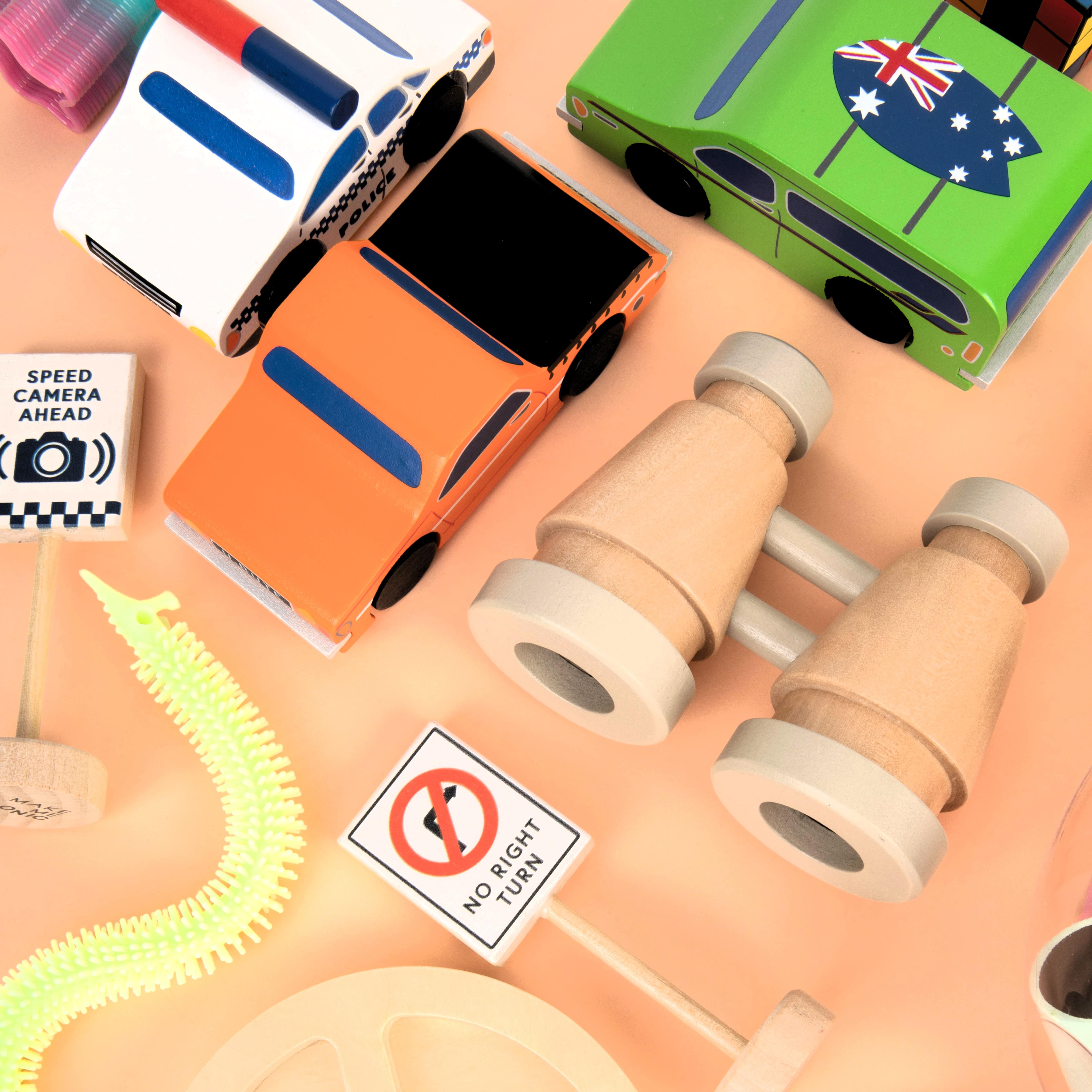 Wooden toy binoculars with a smooth natural finish, perfectly sized for little hands. Ideal for pretend play adventures like pirate hunts, backyard exploration, or spy missions, encouraging creativity and role-play without screens or batteries.