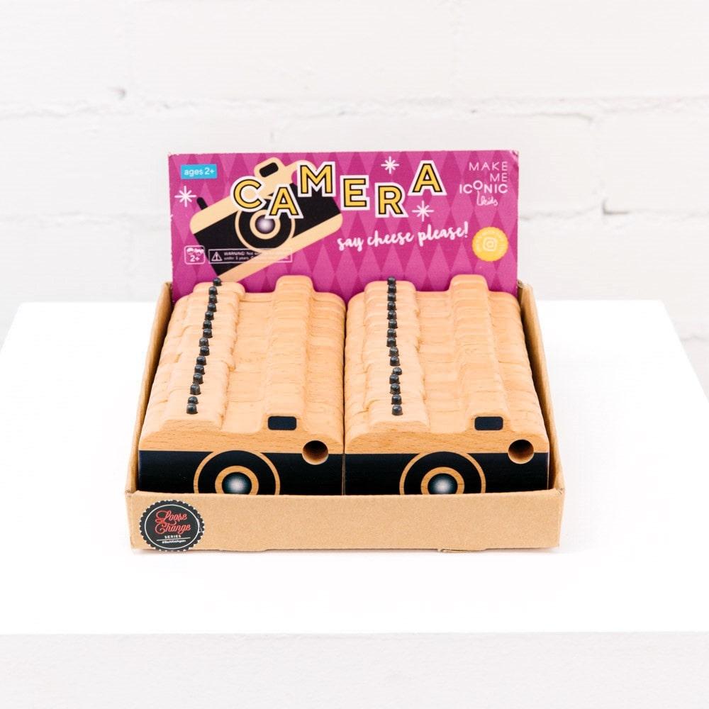 Make Me Iconic wooden toy camera for kids with a real viewfinder and a pressable button, designed for imaginative pretend play and creative role-play photography fun.