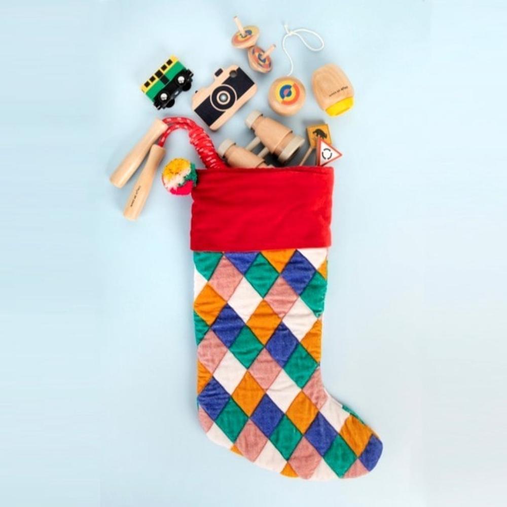 Make Me Iconic wooden toy camera for kids with a real viewfinder and a pressable button, designed for imaginative pretend play and creative role-play photography fun.