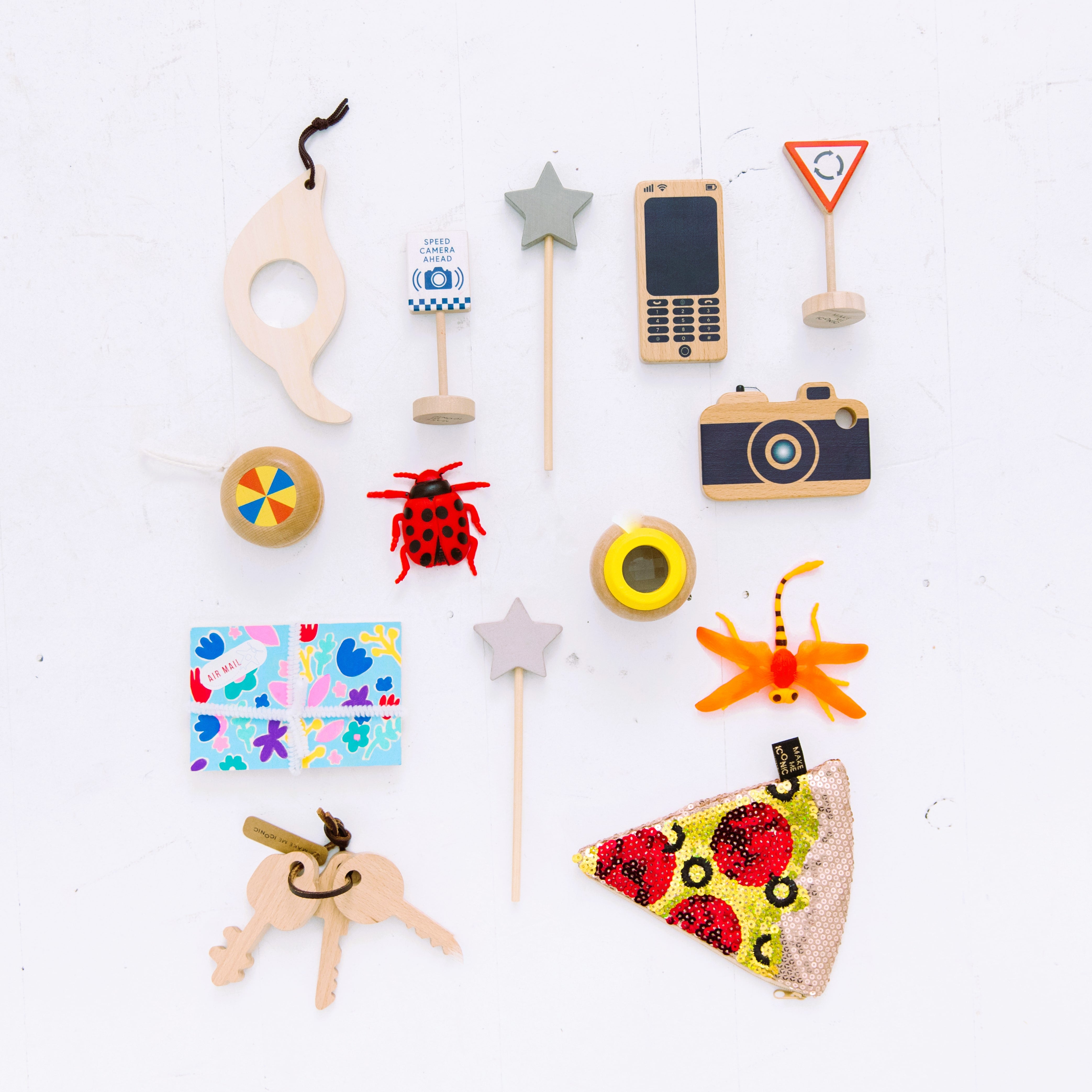 Wooden toy camera for kids with real viewfinder and pressable button, designed for imaginative pretend play and creative role-play photography fun.