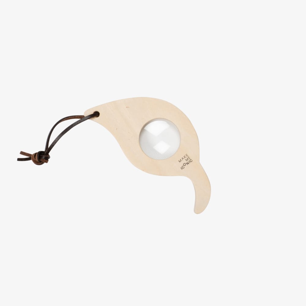 Wooden leaf-shaped magnifying glass for kids, designed to inspire outdoor exploration and nature play. Features a safe plastic lens, sturdy wooden body, and carry loop—perfect for backyard adventures and early science learning.
