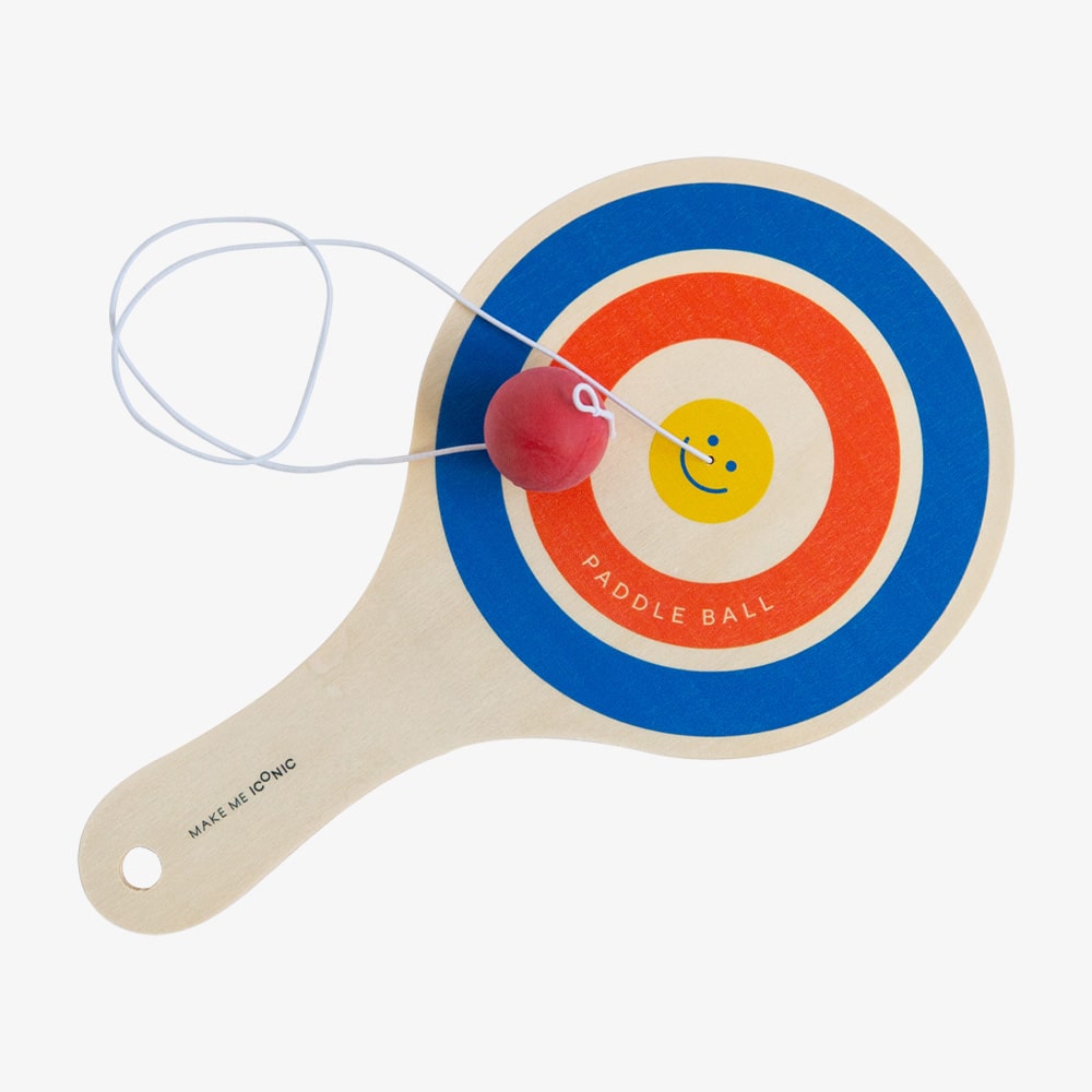 Wooden paddle ball toy with elastic rubber ball, designed for solo play and developing hand-eye coordination. A classic retro toy perfect for travel, parties, or active play at home.
