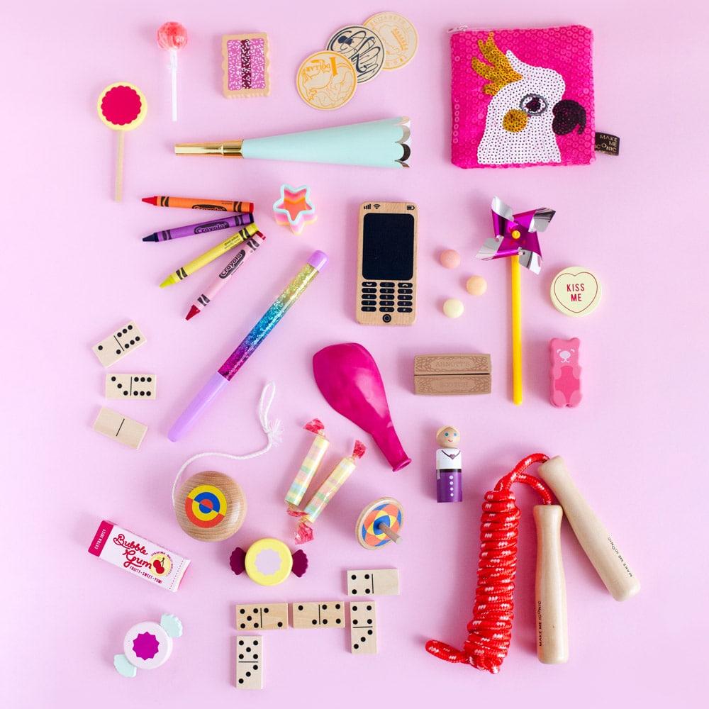 Make Me Iconic Wooden Toy Phone from the Loose Change Range, featuring a realistic design for pretend selfies, texting, and calls. Encourages imaginative, screen-free play for kids who love to copy the grown-ups.