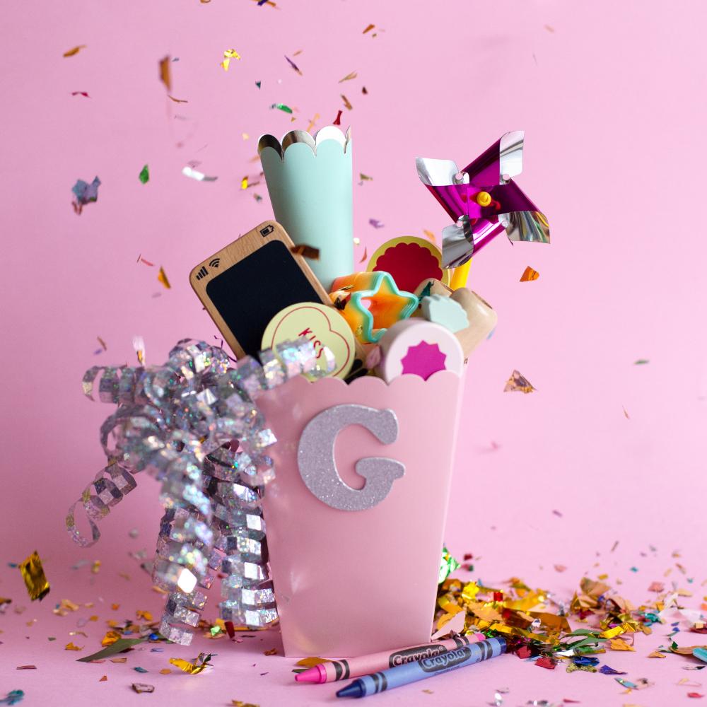 Make Me Iconic Wooden Toy Phone from the Loose Change Range, featuring a realistic design for pretend selfies, texting, and calls. Encourages imaginative, screen-free play for kids who love to copy the grown-ups.