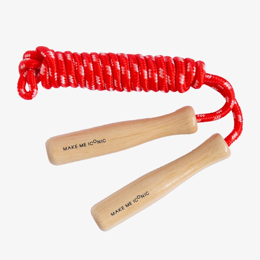 Make Me Iconic wooden skipping rope with smooth natural handles and red-coloured rope, designed for active play, coordination, and classic childhood fun.