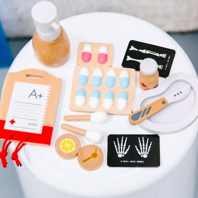 Wooden Toy Surgeon Kit with realistic medical instruments, designed to complement the Doctor’s Kit for advanced pretend play and role play fun.