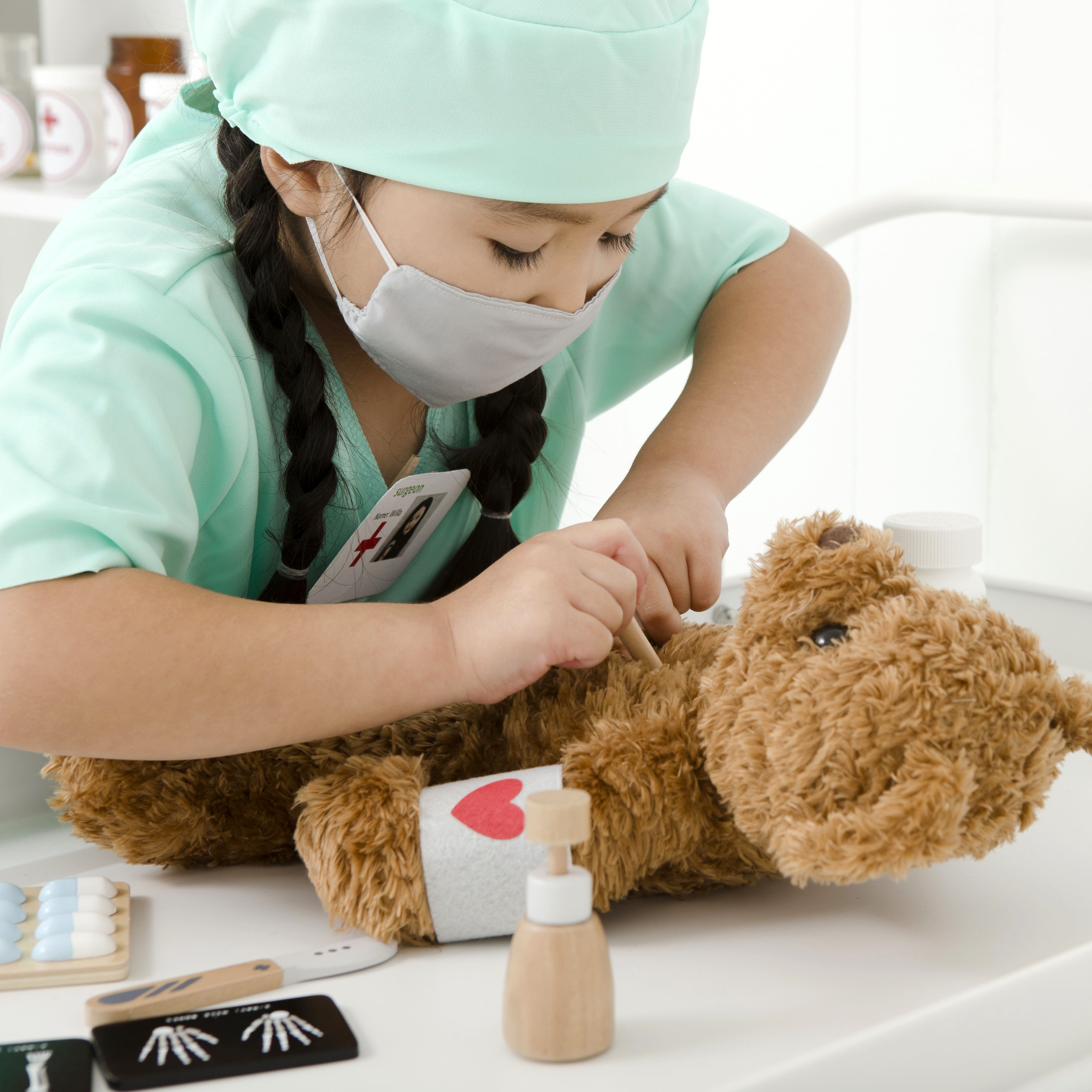 Wooden Toy Surgeon Kit with realistic medical instruments, designed to complement the Doctor’s Kit for advanced pretend play and role play fun.