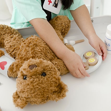 Wooden Toy Surgeon Kit with realistic medical instruments, designed to complement the Doctor’s Kit for advanced pretend play and role play fun.