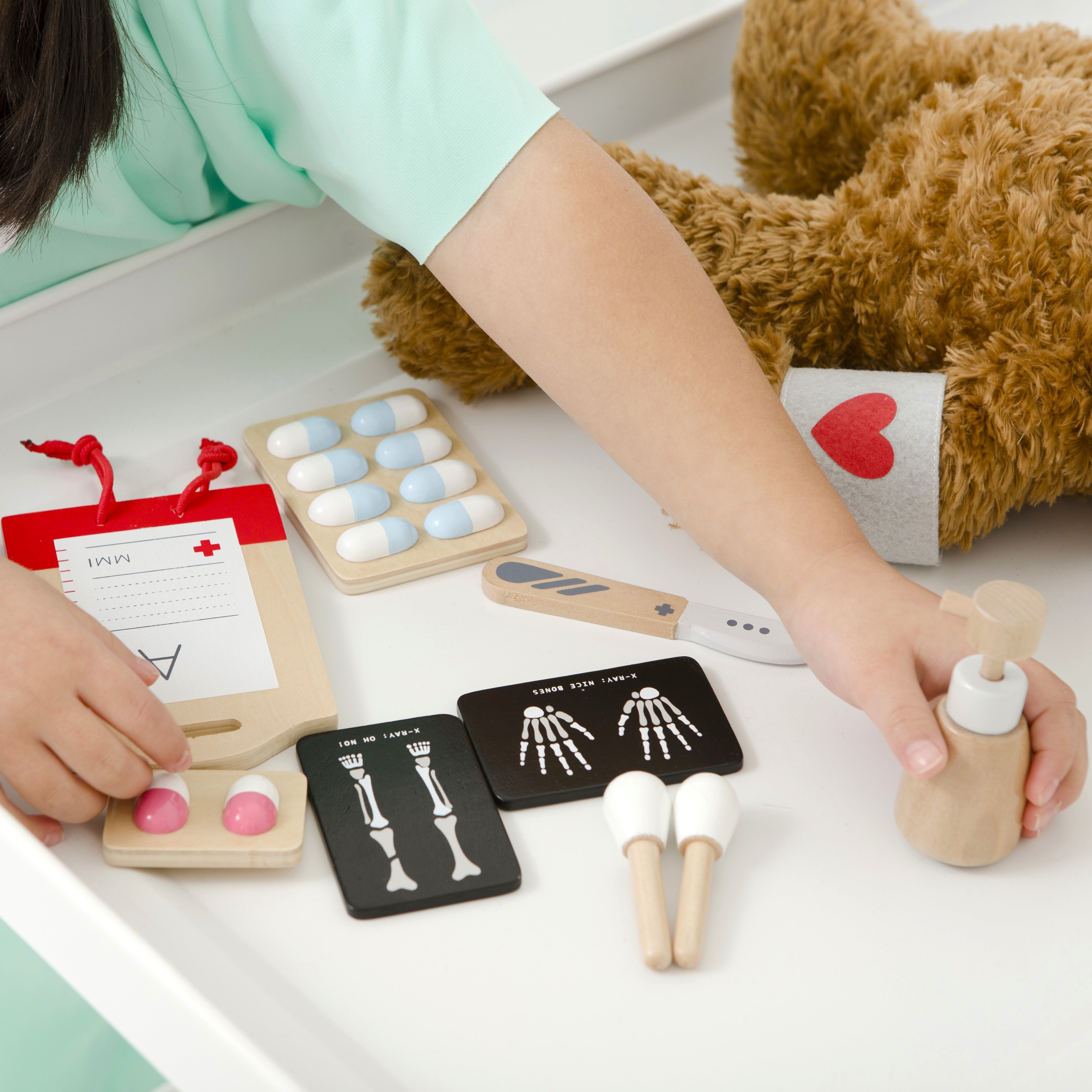 Wooden Toy Surgeon Kit with realistic medical instruments, designed to complement the Doctor’s Kit for advanced pretend play and role play fun.