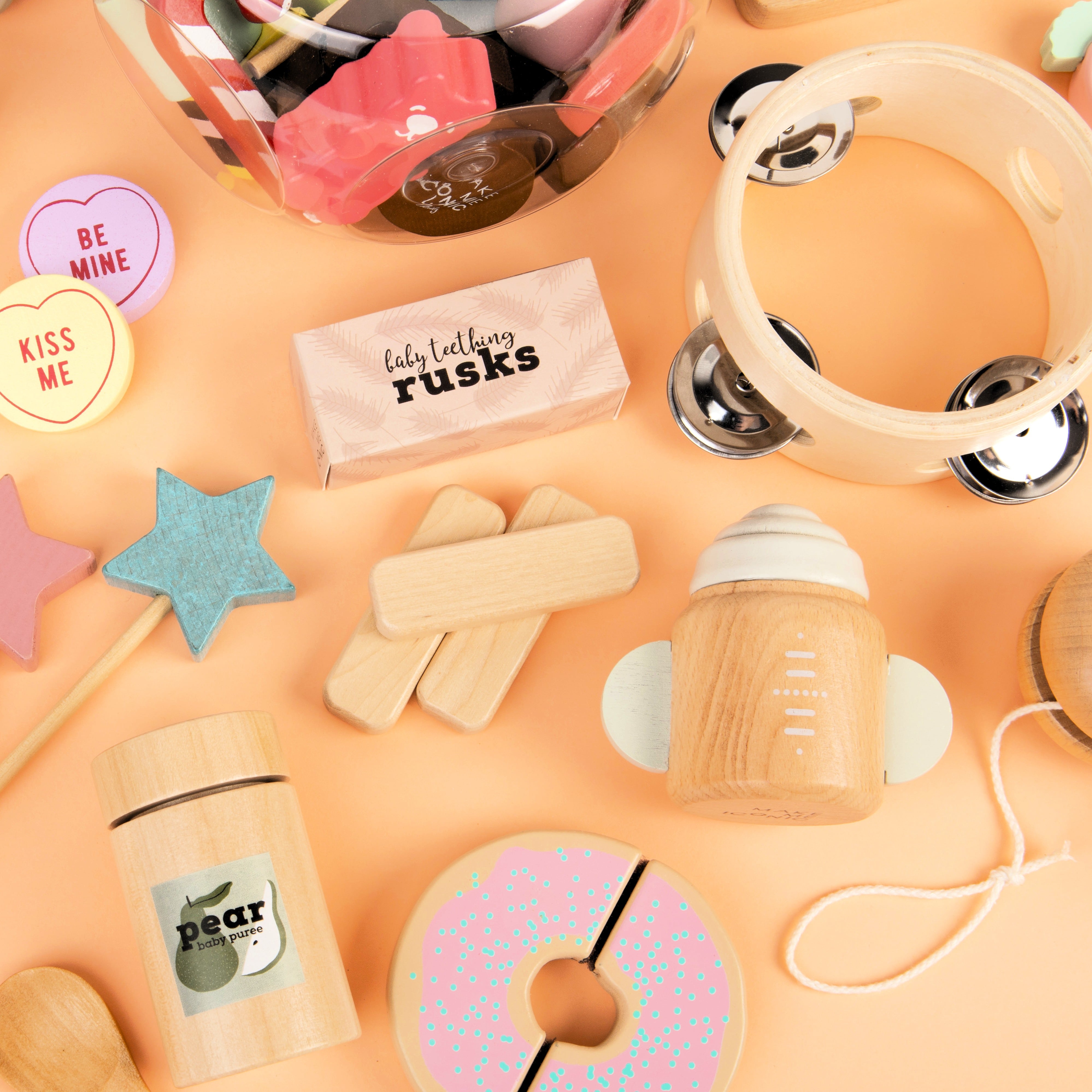 1-piece wooden toy tambourine with a classic round design, perfect for musical pretend play. Encourages young kids to explore rhythm, coordination, and creative expression through music.