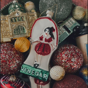 Melbourne Christmas glass ornaments in a gift box featuring Australian holiday decorations such as the Skipping Girl, W-Class Tram, Flinders Street Station, and Coffee Snob designs.