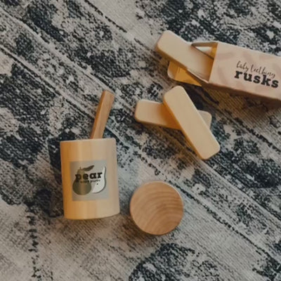 Make Me Iconic 3-piece wooden toy jar set with jar, removable lid, and wooden spoon is perfect for pretend play, scooping fun, and imaginative role play.